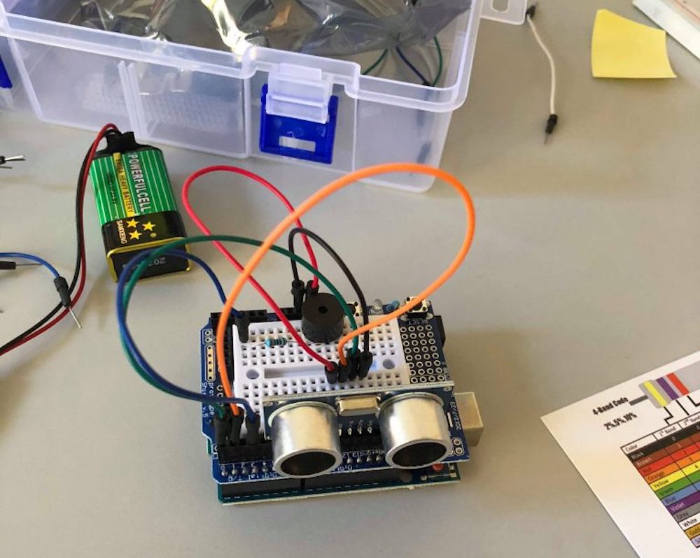 The electronic components consisted of an ultrasonic proximity sensor and a buzzer connected using an Arduino microcontroller.