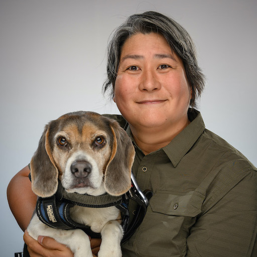 Professor Karen Nakamura with her service dog Momo